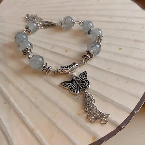 Vintage Style Gray Crackle Bead Bracelet with Silver Butterfly Chain Tassel Charm Unique Boho Jewelry for Women Perfect for Gift