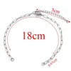 Pulsera de 2.5 pulgadas con cruz de acero en color plata.