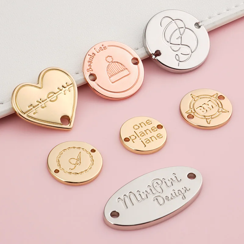 Design Two Holes Rose Gold Metal Tags with Logo for Swimwear Cloth