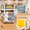 Kit de manualidades de libro de tela hecho a mano con conejito de mezclilla retro