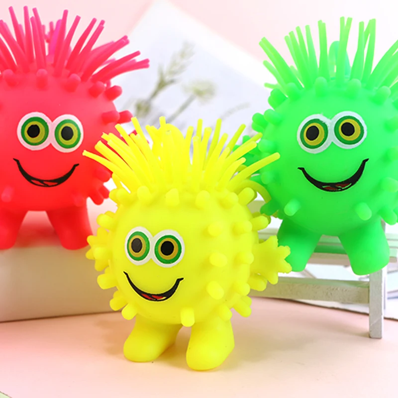 TPR Soft Rubber Light up 23 Branches Snowflower Puffer Ball Toy LED Puffer Ball Big Eye Cute Octopus Toy