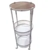 White three-tier rotating storage rack