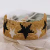 Gold with 5 black star
