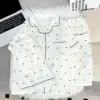 Set tre pezzi in cotone nuvola a pois bianco kt