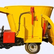 Multi-functional three-wheeled self-propelled feed mixing and spreading truck