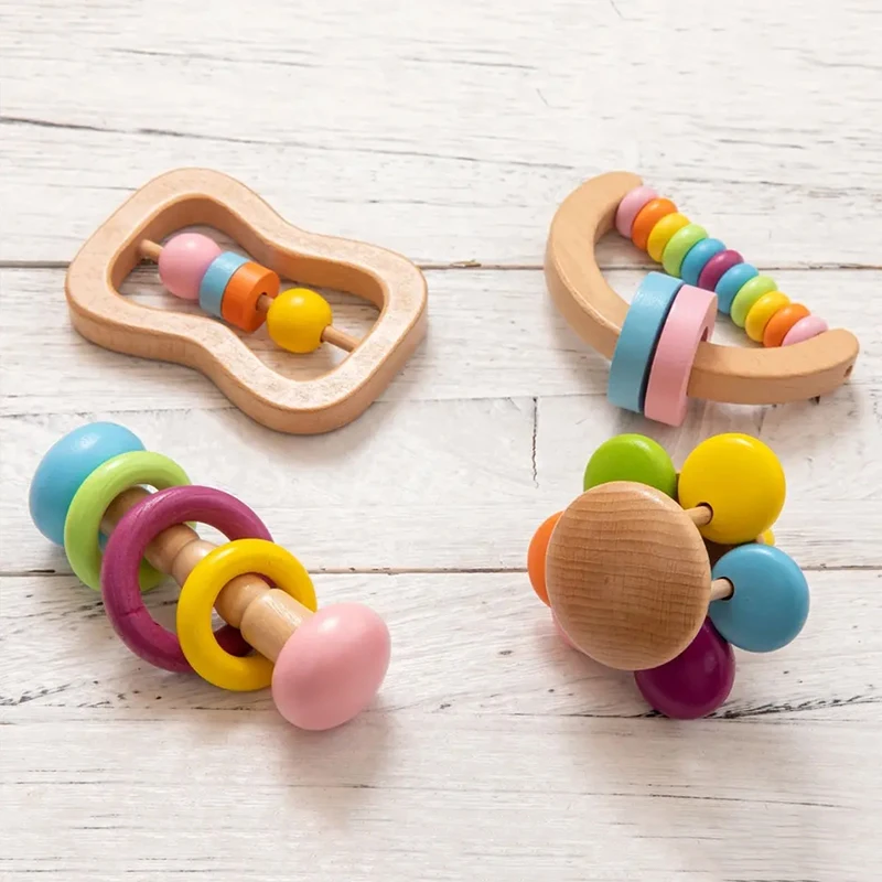 4pc Organic Colorful Baby Rattle Set Safe Food Grade Wood Rattle Soother Bracelet Teether Set Montessori Toddler Toy