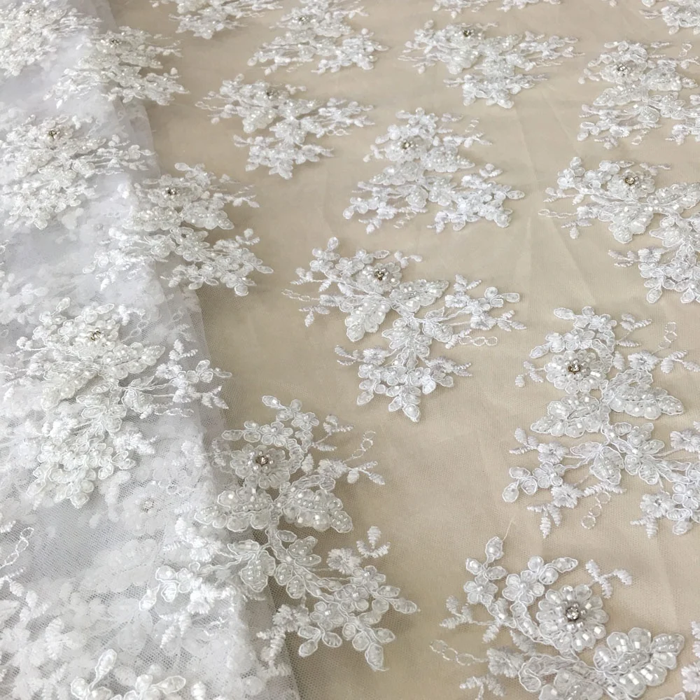 
Роскошная белая вышитая кружевная Тюлевая ткань для невесты с тяжелыми ручными бусинами и блестками кружевная ткань со стразами для свадебного платья 