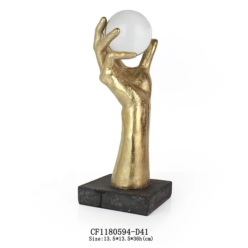 Resin hand with crystal ball home and table decoration