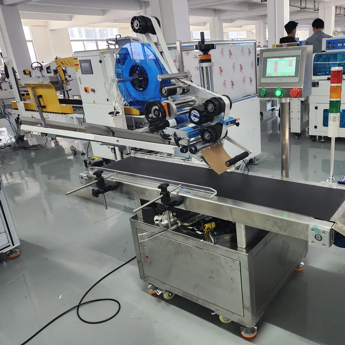 Automated Hang Tabs Machine - Efficient Packaging Solution