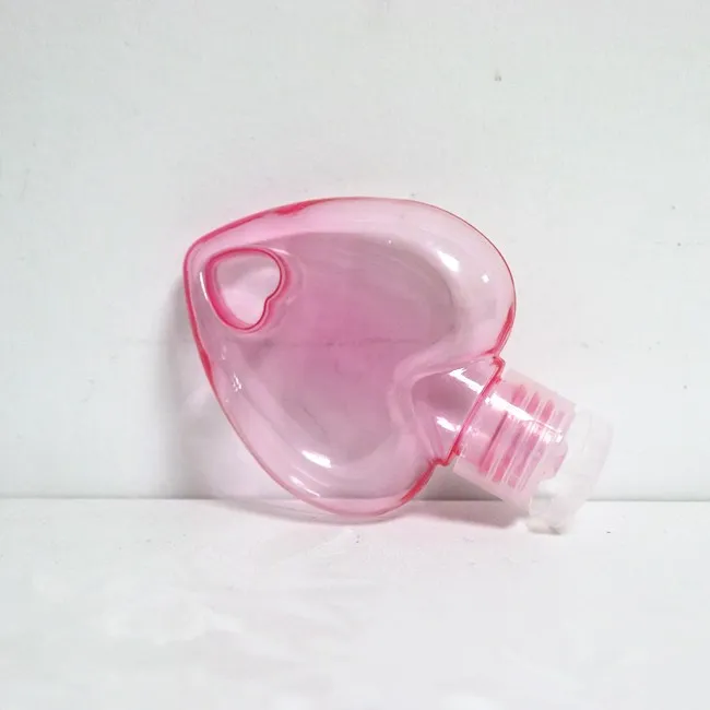 2025 Custom PETG Heart Shape Empty Hand Sanitizer Bottle with Hook 50ml Plastic Gel Bottle with Keychain