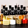 Seasoning bottle with honey stick