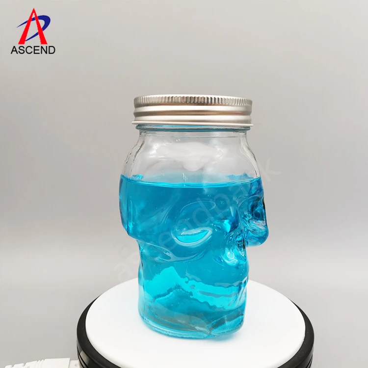 Custom Colored Skull Shape Glass Mason Jar 16OZ 500ml Glass Jar with Screw Metal Lid and Straw for Drinking