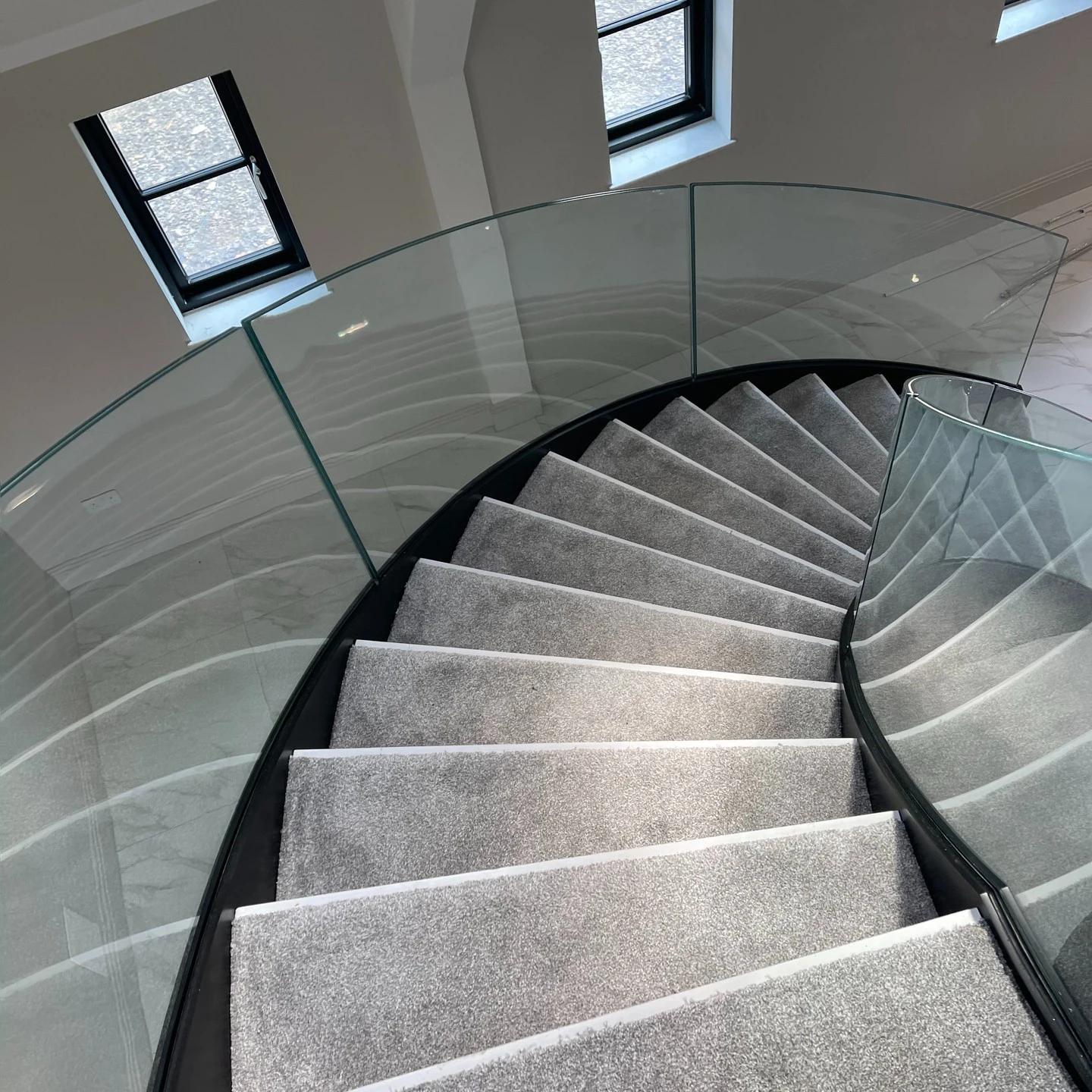 Natural Stone Curved Stairs Design  Glass Staircase Railing Tiles Tread White Panda Marble Stairs