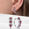 Orecchini in oro bianco con pietra rossa