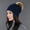 Navy Blue with brown pom