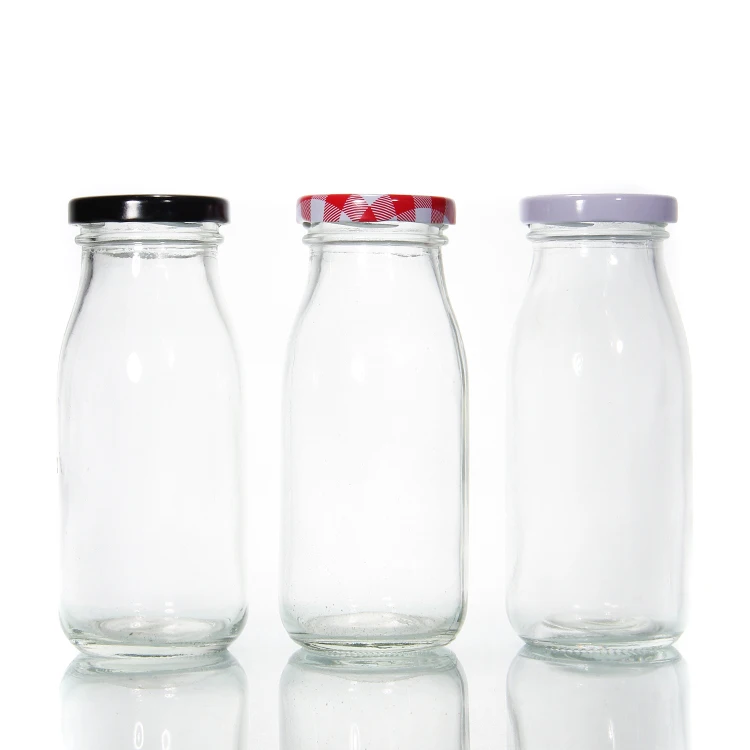 DHSBTLS 4 bottiglie per latte in vetro con coperchio, 1 l, riutilizzabili, per conservare latte fresco, ermetiche, resistenti, per succhi, miele, sciroppo, 2 coperchi e adesivi