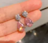 Pink diamond ear studs