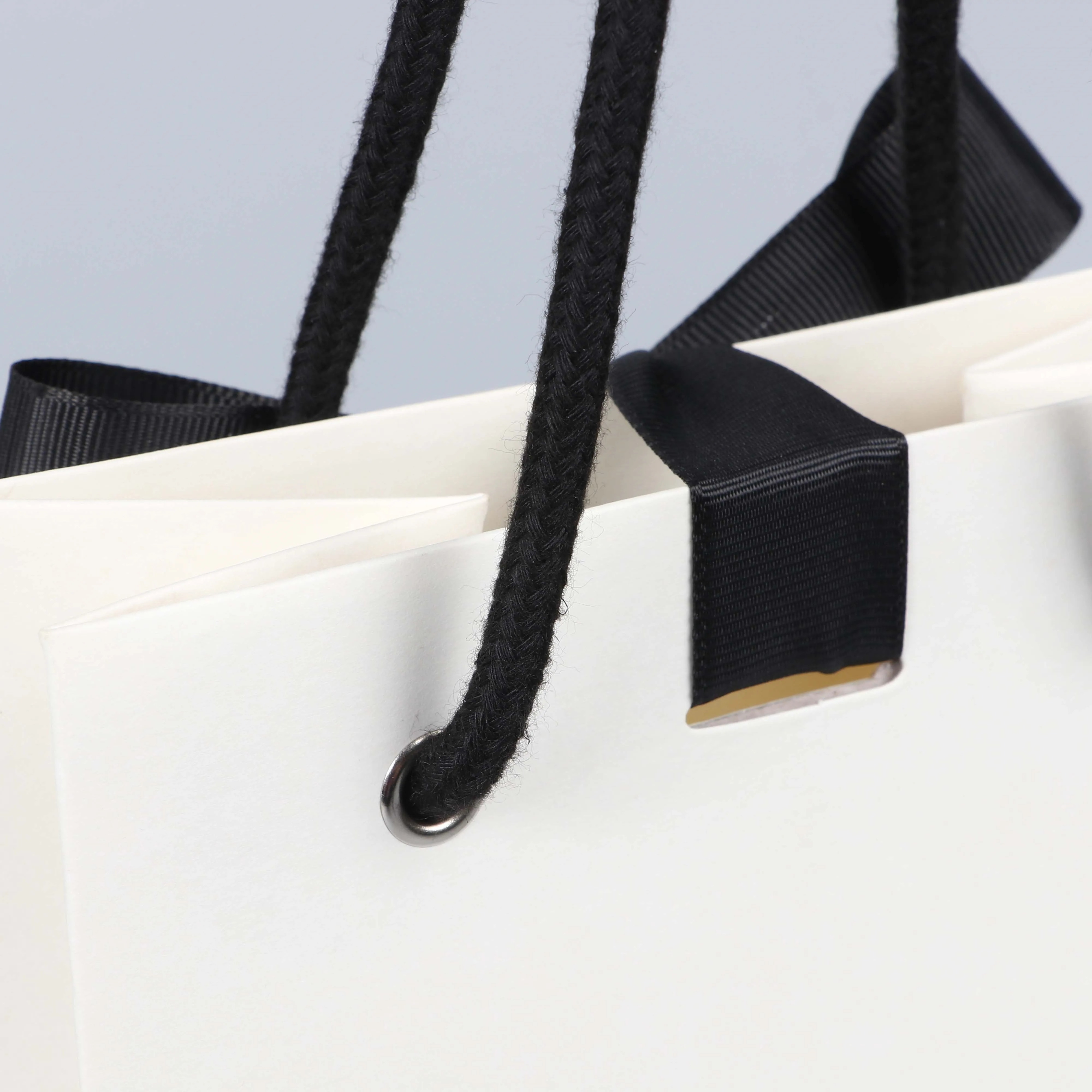 Sturdy Durable Thick White Gift Bag With Black Handle And Ribbon