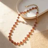 Rose pink diamond with gold accents