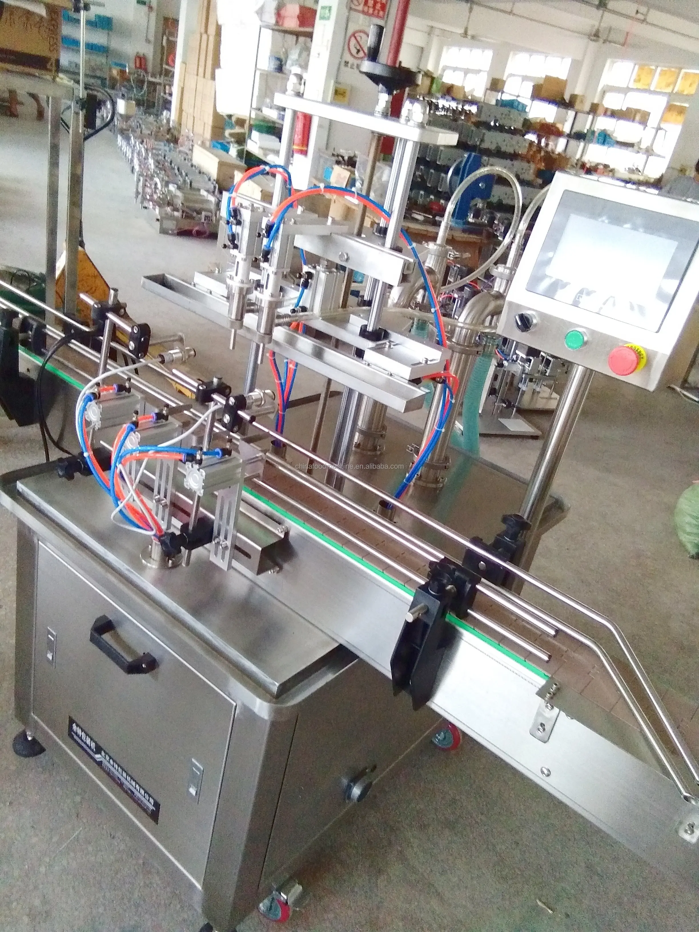 Good Selling 4 Heads Automatic Vacuum Liquid Filling Machine 50 Bpm