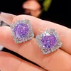 Purple ear studs