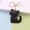 Hebilla de cadena dorada-gato-negro
