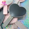 Black heart shaped handheld mirror with rhinestone