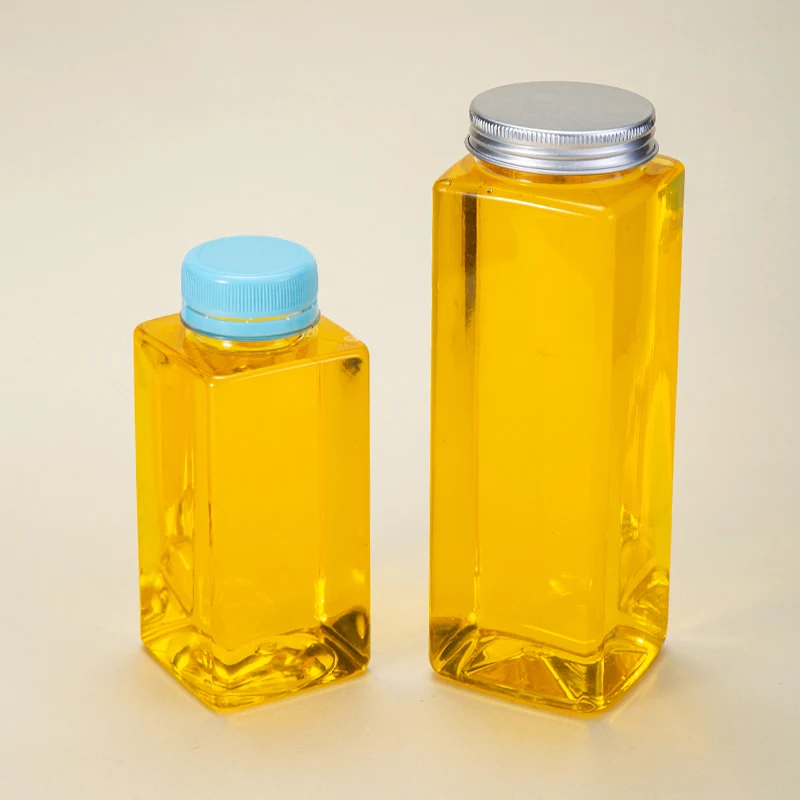 Custom Logo Cylindrical Transparent Design PP 250ml Plastic Bottles 500ml Aluminum Lid Juice Bottles factory