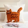 Petit coussin chat orange