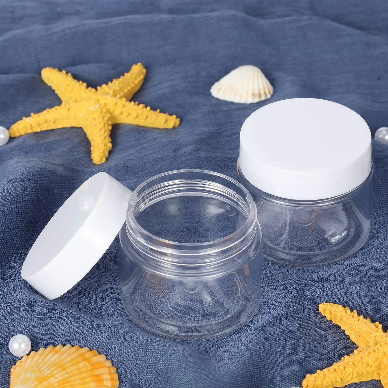 China Supplier 2oz Plastic Pot Jars Round Clear Leak Proof Plastic Cosmetic Container Jars with White Lids for Travel Storage