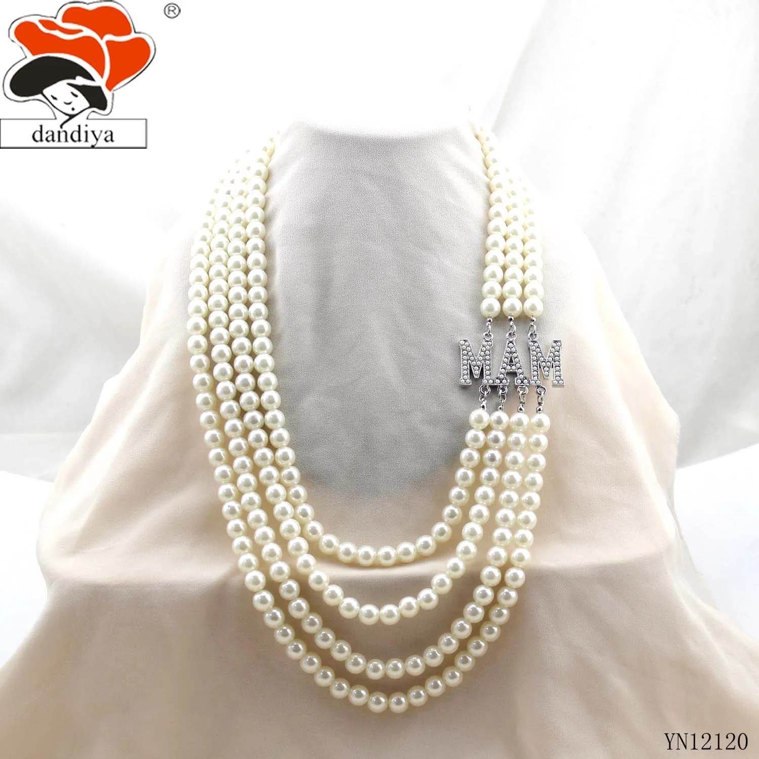 layered pearl necklace with side pendant