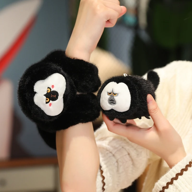 卸売ホワイトフェイスサキモンキーぬいぐるみクラップリングぬいぐるみ