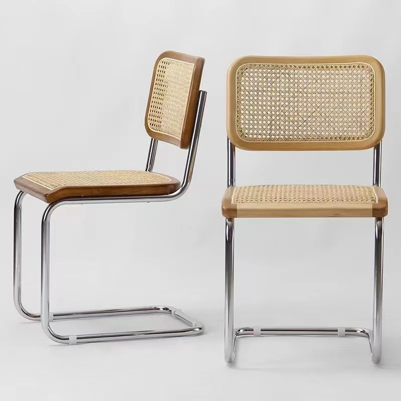 Wholesale Modern Nordic Pe Rattan Dining Chair Metal Frame Bow Legs