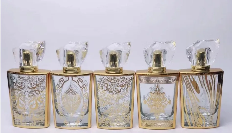 product 30ml 50ml 60ml dubai high quality uv engraved octagonal bottle gold glass perfume special shaped empty attar oud bottle-29