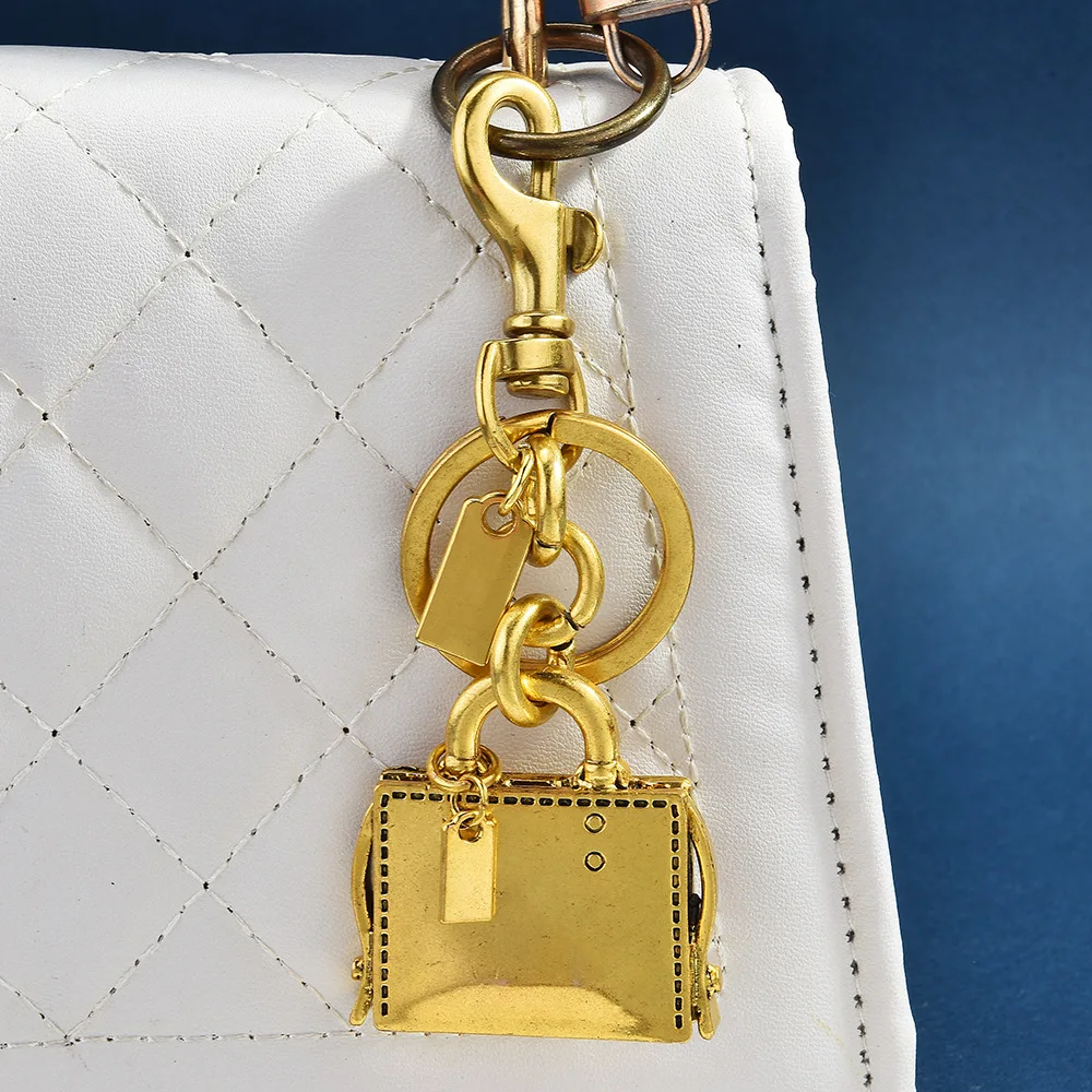 Einfacher, modischer Metallanhänger-Schlüsselanhänger für Damen, ideal für Schulranzen und Schmuck. Großhandel für Taschenaccessoires._voghion.com