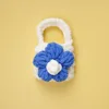 Blue-flowered white bag