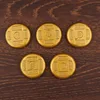 Un conjunto de monedas de Fortuna, Prosperidad, Longevidad, Felicidad y Riqueza.