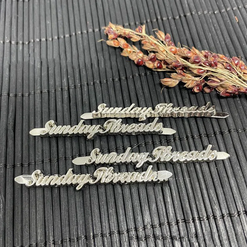 Customized Letters Perforated Metal Labels For Bags Zinc Alloy Brand