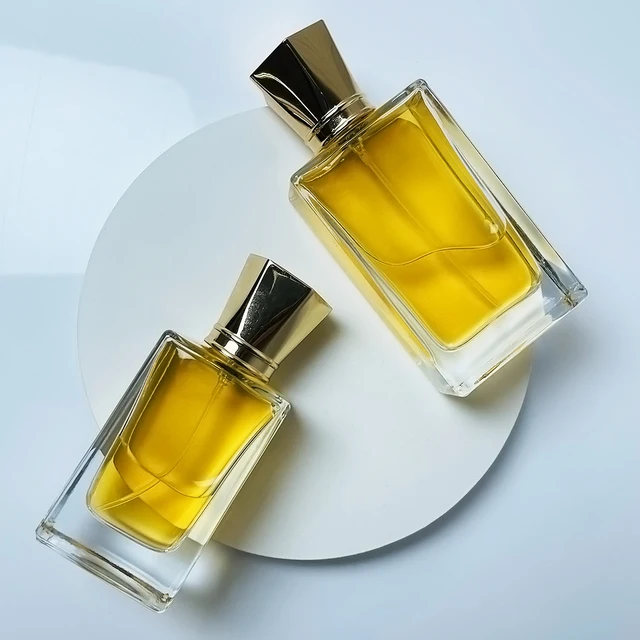 New Design Luxury Flat Rectangle Shape Mist Spray Fragrance Bottle 30ml 50ml Crimp Perfume Glass Bottle with Golden Lids