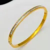 29-d-10 golden bracelet square-cut diamonds, color fades, return