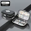 Large 7-compartment black with English labeling