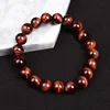 Bracciale occhio di tigre rosso