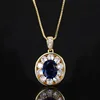 Gold blue pointed crystal pendant with chain
