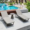 Two reclining lounge chairs with tea table-stone slab top