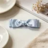 Blue polka dot bow design