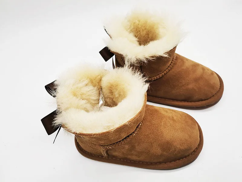 Детские милые красивые женские туфли, украшенные бантами; Из овечьей кожи; Зимние сапоги с настоящим шерстянным подкладом теплые ботинки для снежной погоды