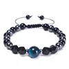 Blue Tiger eyes stone + Black gallstone