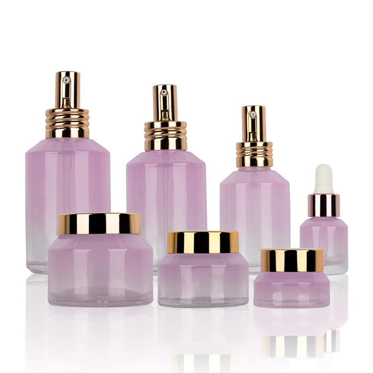 Cosmetic packaging pink slant shoulder glass bottle with gold lid/pump/dropper lotion bottle cream jar sets