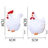A pair of white rooster and hen