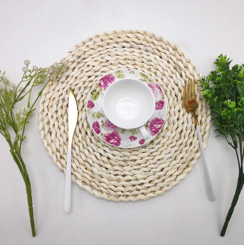 Guangzhou tableware accessories round corn bran table mat woven charger plates